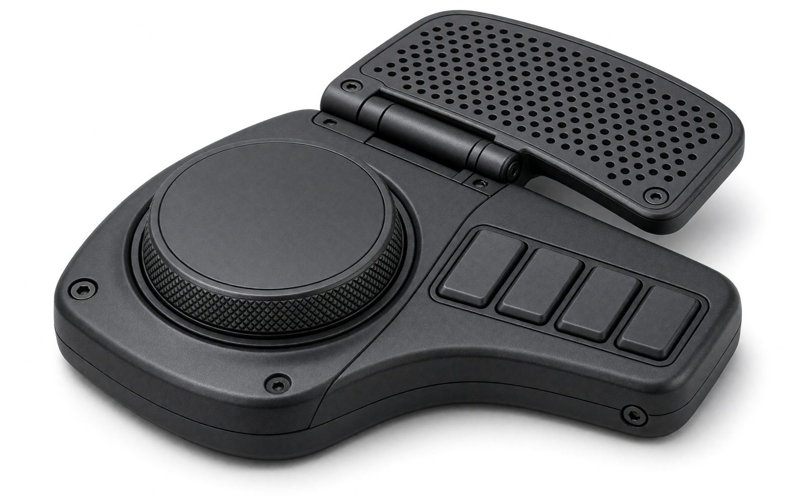 Matte black aluminium video-editing controller with a large knurled jog wheel, four keys and a hinged perforated wrist rest on a white background