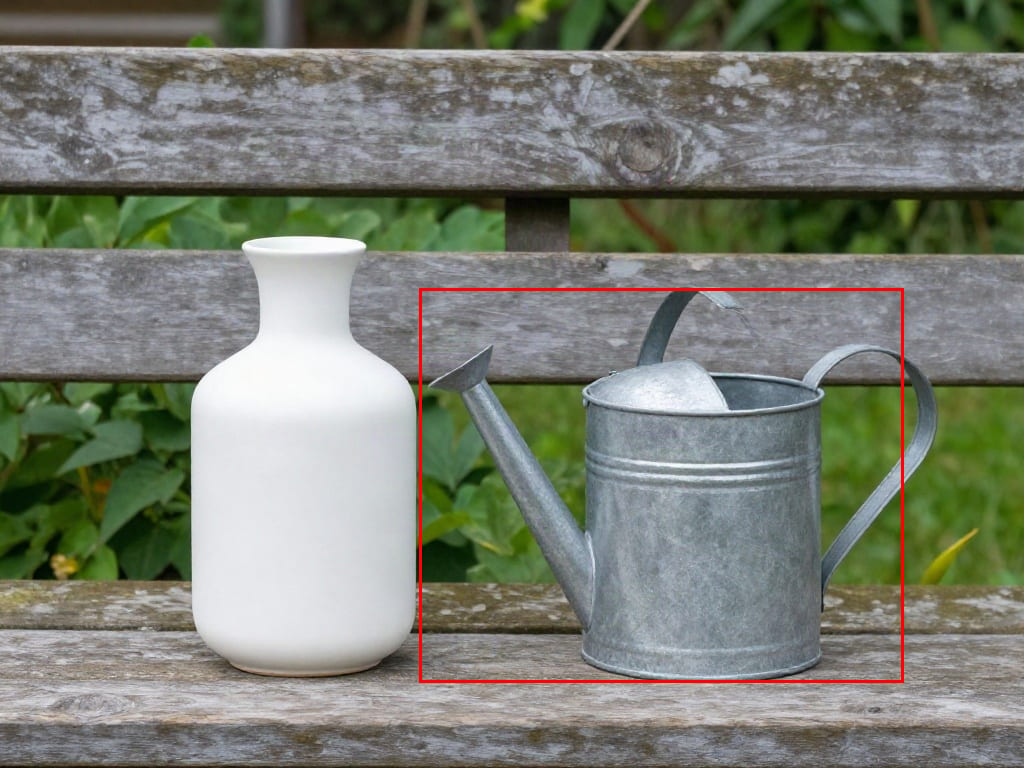 Moondream Detection bounding box accurately localizing a metal watering can.