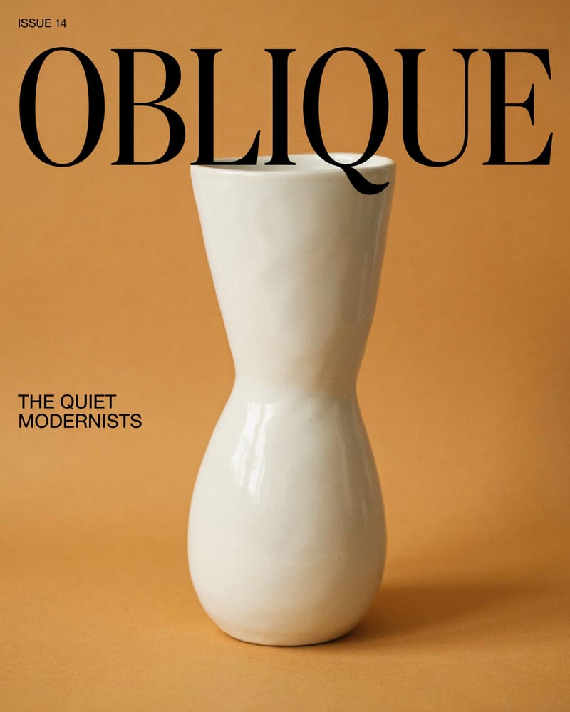 Magazine cover with black didone masthead OBLIQUE overlapping a white ceramic vase on ochre, cover line THE QUIET MODERNISTS and ISSUE 14