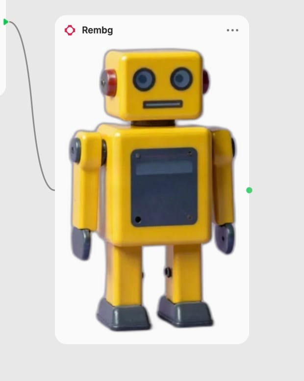 Actual transparent cropped yellow robot result displayed in its Rembg node.