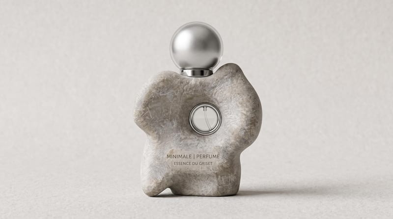 Sculptural fragrance bottle with a textured stone finish and polished spherical cap.